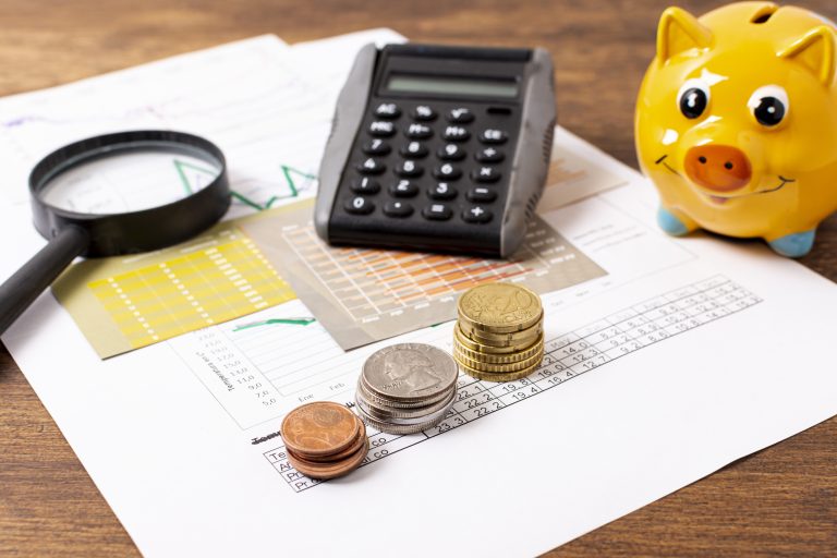 front-view-piggy-bank-stationery-items